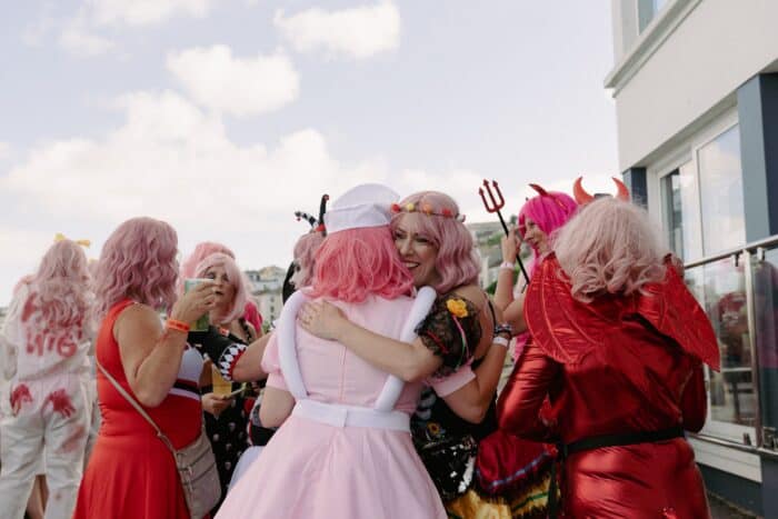 charity-pink-wig-cornwall-working-boat